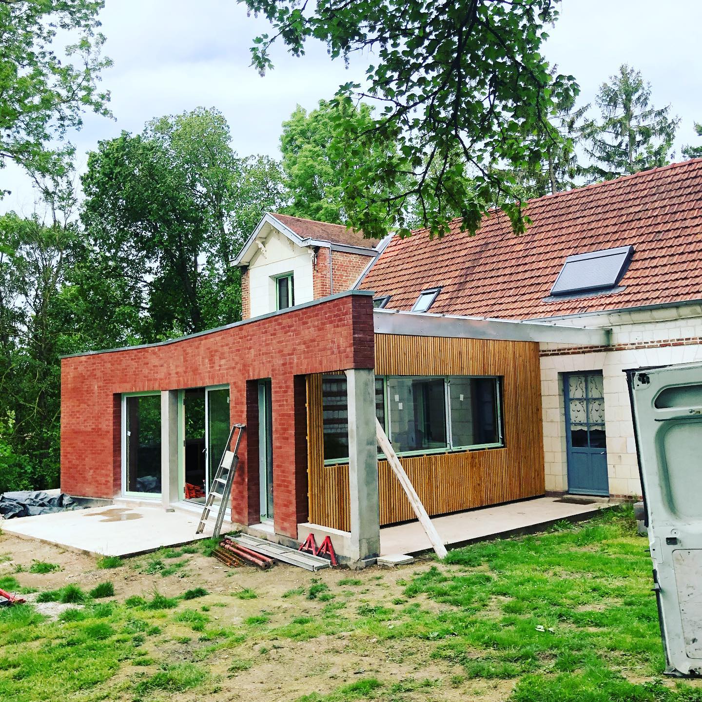 Agrandissement avec terrasse et pose de briquettes