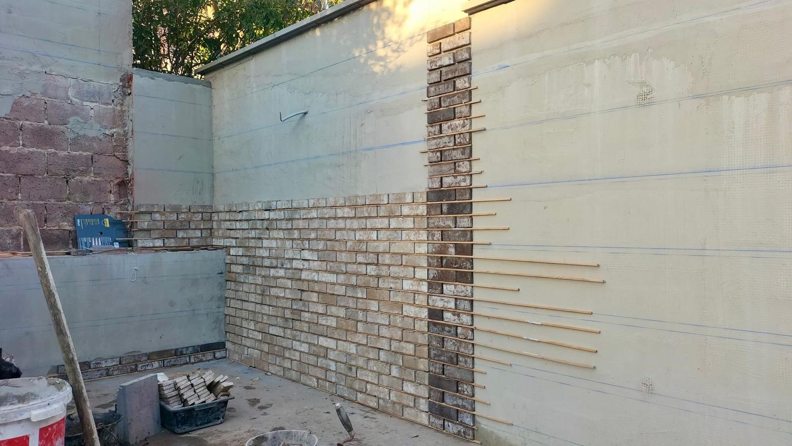 Pose briquettes cheminement terrasse - Photo 1